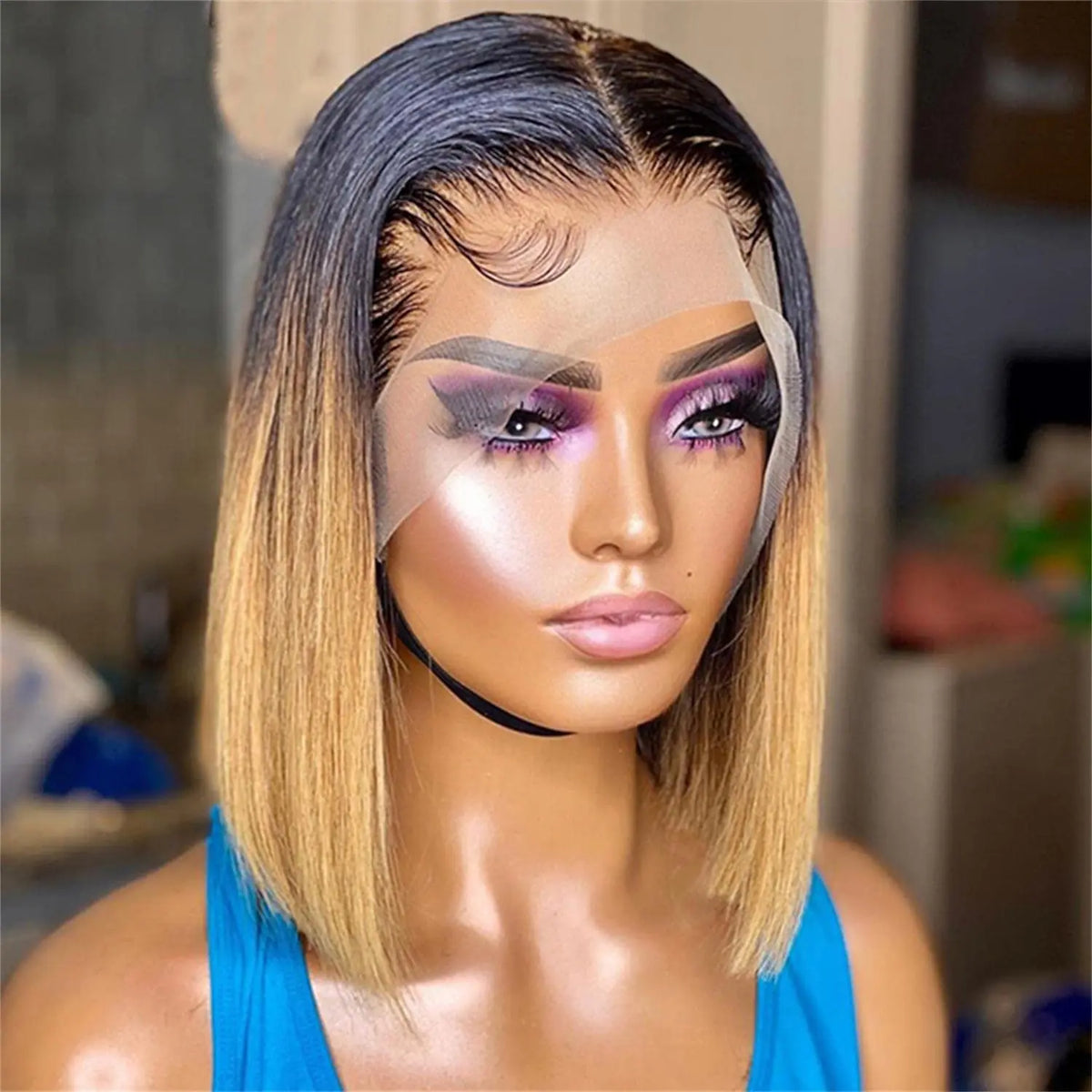 A mannequin showcasing a Straight 13x4 Lace Front Bob Wig with a full head of hair, featuring a ombre color transition from dark at the roots to lighter at the ends.