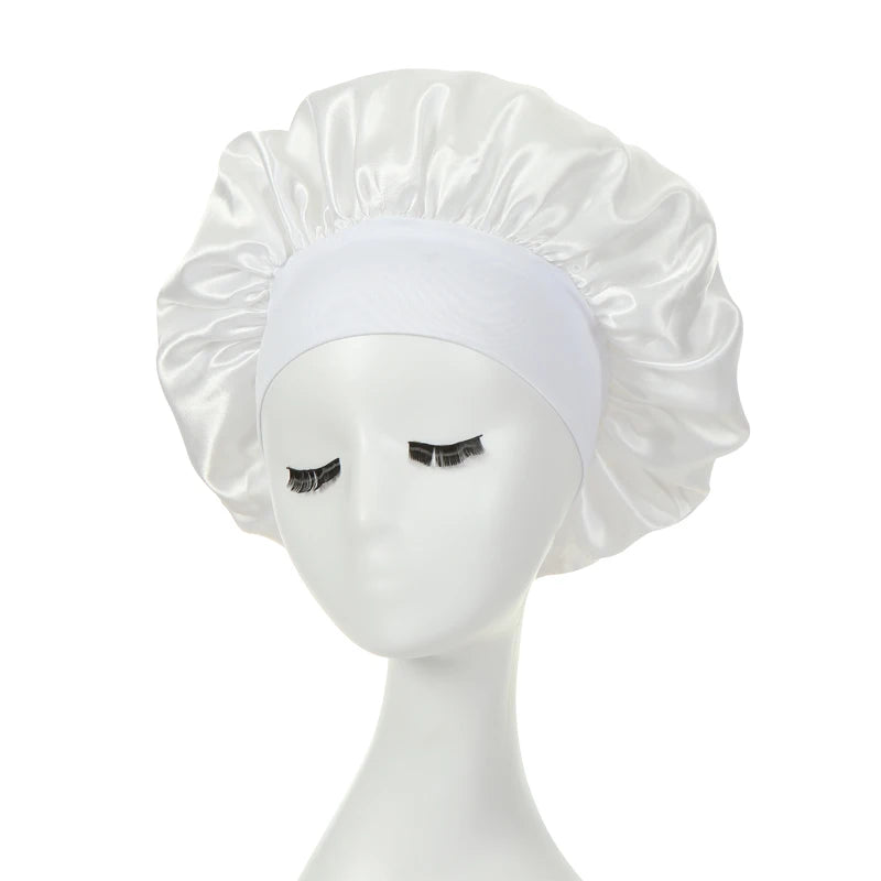 a white silk bonnet on a mannequin 